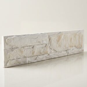 Un azulejo de imitación piedra blanca marfil con textura rugosa