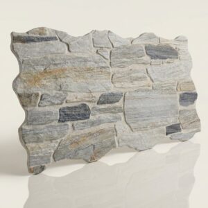 Pieza de piedra caliza con efecto muro, forma irregular, texturas variadas, colores grises y beige, acabado natural.