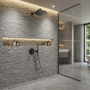 Baño interior con estilo moderno, revestido con piedra gris, suelo de piedra y mampara de vidrio, con ducha y lavabo.