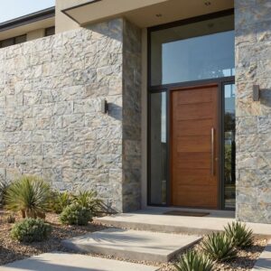 Entrada de casa moderna con revestimiento exterior fachada de imitación piedra Vol