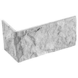 Pieza rectangular de piedra gris con textura rugosa y acabado mate