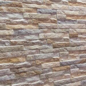 Textura rugosa de piedra decorativa con colores beige y gris claro